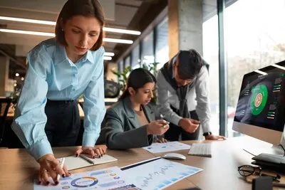 People analyzing and checking finance graphs in the office