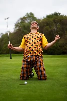 Man having a game of golf outdoors