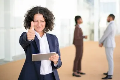 Happy businesswoman recommending new business app