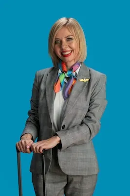 Medium shot smiley stewardess posing