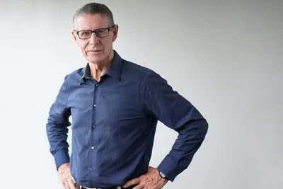 Portrait of Confident Senior Man Wearing Glasses