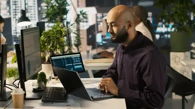 Jolly bookkeeper at work happy after finishing verifying business documents