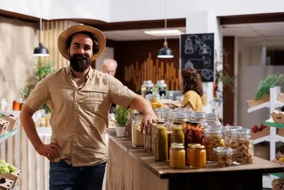 Man buying fresh vegetables in store