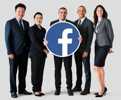 Business people showing a Facebook icon